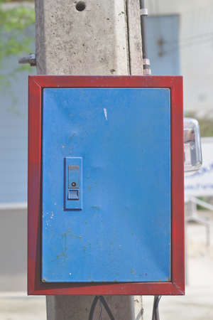 Blue and red light circuit box on the poleのeditorial素材