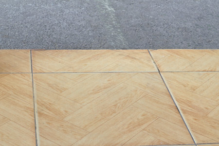 Brown glazed tile floor Diagonal surface pattern Asphalt pavement surface background.The floor level of the house is tiled with a paved roadのeditorial素材