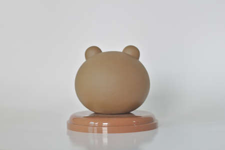 Brown Teddy Bear Head Coffee Mug Lid White Background Collectibles Toys Coffee Drinkers Cute Dolls Drinks in front of the cinemaのeditorial素材
