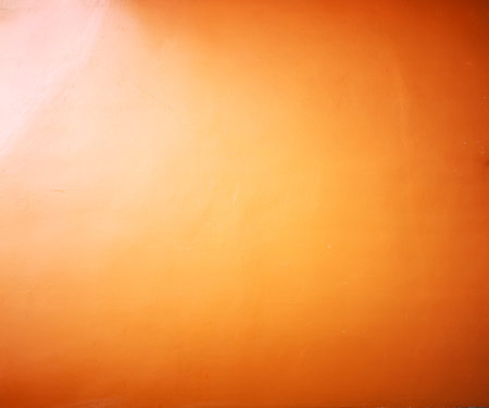 Orange abstract gold background yellow color, gradient illustration background, light corner spotlight, faint orange vintage background. Colorful horizontal square.の写真素材