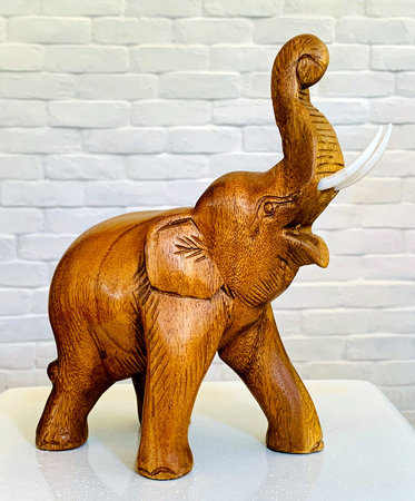 The wooden Thai elephant is the most famous handicraft of Thailand.の写真素材