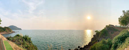 Full HD wallpaper background coastline walkway path along with crystal clear sea, blue sky with white cloud beautiful seascape panorama. Rock composition of nature coast view. Chanthaburi, Thailand.の写真素材