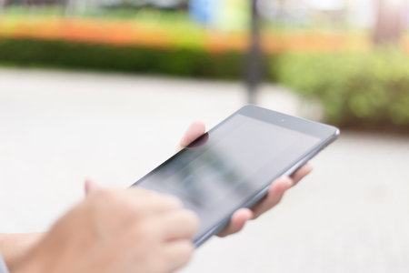 Close up man use tablet
