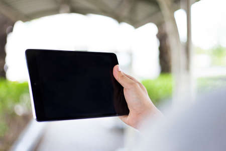 Close up man use tabletの写真素材