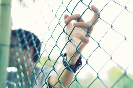 Man hold cageの写真素材