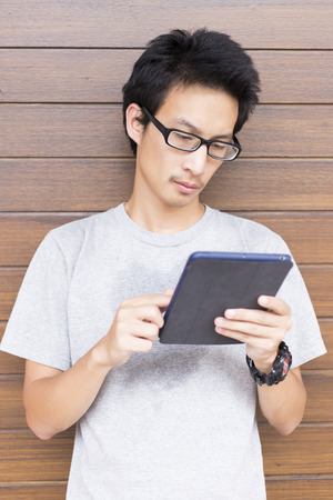 Man Using Tablet: Medium Shotの写真素材