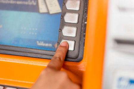 Hand entering on ATM bank machine
