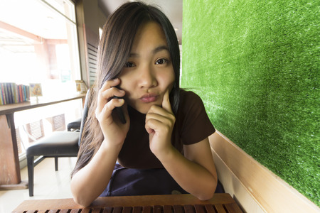 Woman be Happy when She Talking Smartphoneの写真素材