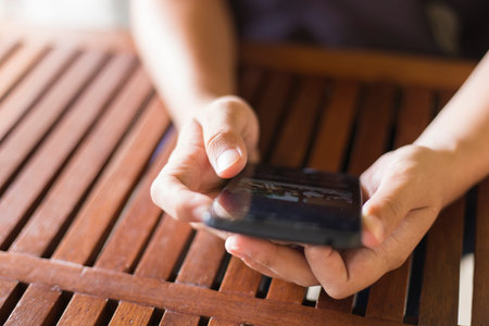 Woman Using the Smartphone for Business at Cafe