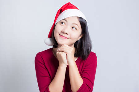 Happy Woman Praying in Christmas Dayの写真素材