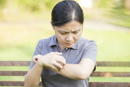 Woman Scraching her Selfの写真素材