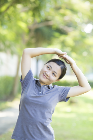 Woman with Relax Time at Parkの写真素材
