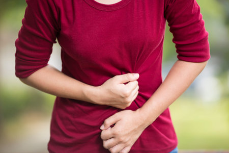 Woman Has Stomach Ache at Park