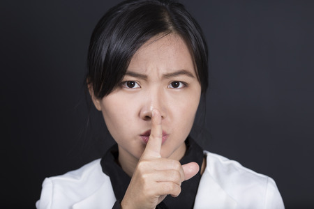 Businesswoman Be Quiet Gestureの写真素材