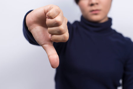 Woman show thumb down
