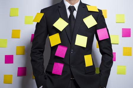 Businessman with notepaperの写真素材