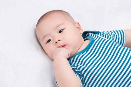 Adorable baby feel confuseの写真素材