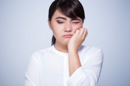 Woman has toothacheの写真素材