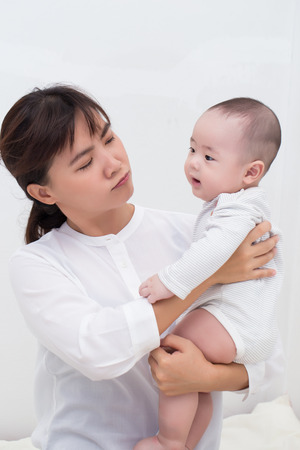 Angry mother talking with her sonの写真素材