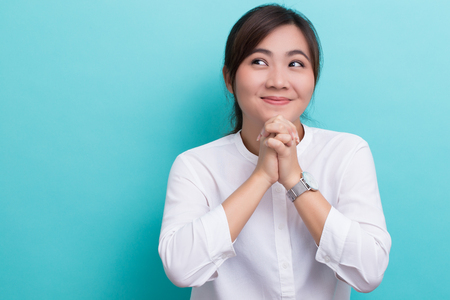 Asian woman thinking and happyの写真素材