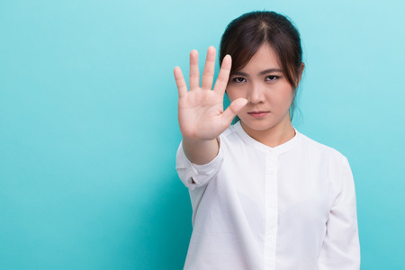Woman making stop signの写真素材