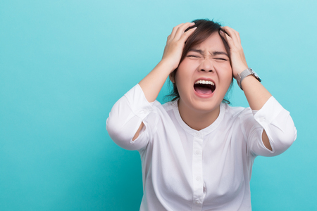 Angry woman on isolated backgroundの写真素材