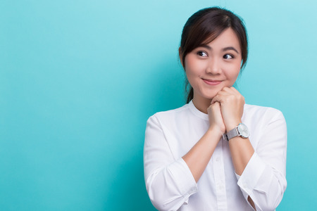 Asian woman thinking and happyの写真素材