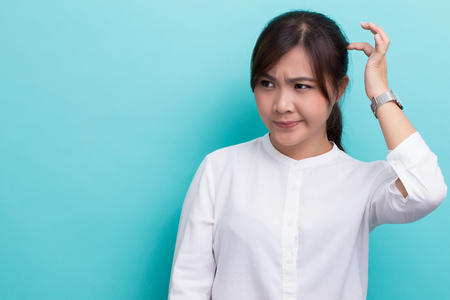Woman scratching her headの写真素材