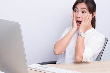 Woman use computer and she afraid somethingの写真素材