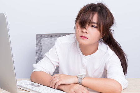 Woman take a nap at officeの写真素材