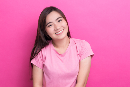 Asian woman is happy on isolaed backgroundの写真素材