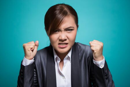 Angry woman screaming outの写真素材