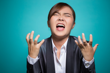 Angry woman screaming outの写真素材