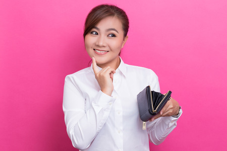 Happy woman with walletの写真素材