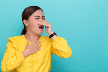 Woman has sore throatの写真素材