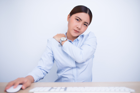 Woman has shoulder pain from workの写真素材