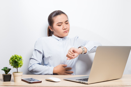 Hungry woman at office