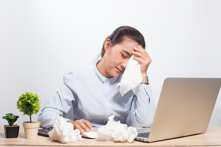 Woman so sad when she look at laptopの写真素材