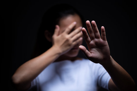 Sadness of a woman in the dark