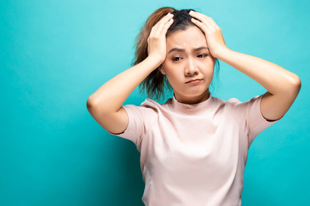 Woman suffering from head acheの写真素材