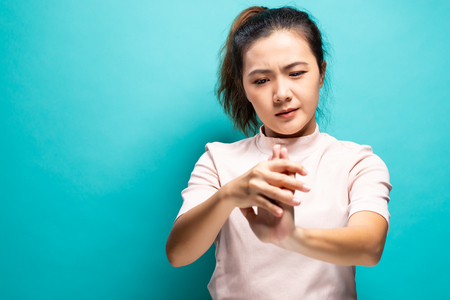 Woman suffering from hand painの写真素材