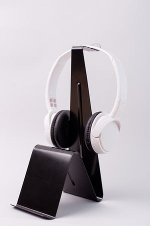 White headphones isolated on white backgroundの写真素材