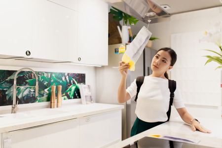Woman shopping and choose the decorative for kitchen roomの写真素材