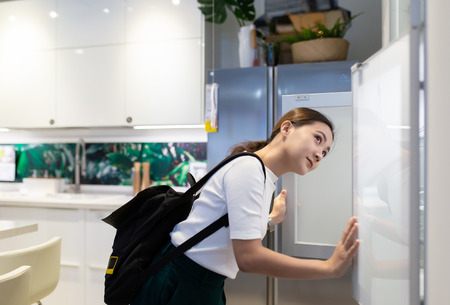Woman shopping and choose the decorative for kitchen roomの写真素材