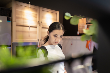 Woman shopping and choose the decorative for kitchen roomの写真素材