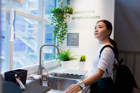 Woman shopping and choose the decorative for kitchen roomのeditorial素材