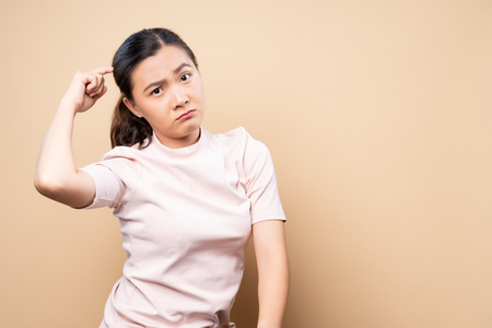 Woman scratching her headの写真素材