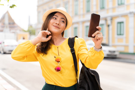 Happy woman take a selfie on vacation timeの写真素材