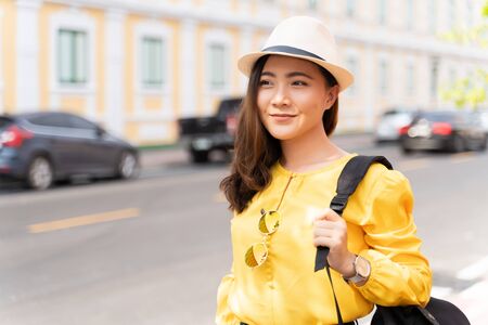 Happy woman traveling in Thailandの写真素材