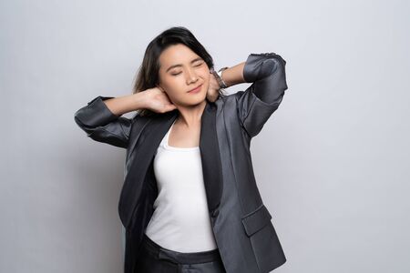 Woman has body pain : Office syndrome conceptの写真素材